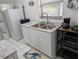 Bright and functional kitchen with a double sink and ample counter space at 820 Coconut Rd, Venice, FL 34293