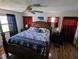 Spacious bedroom featuring nautical decor, wood furniture, and abundant natural light at 820 Coconut Rd, Venice, FL 34293