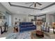 Open-concept living space with a kitchen and dining area offers relaxed seating and plenty of natural light at 8726 Backshore Ln, Parrish, FL 34219
