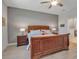 Comfortable main bedroom with traditional furnishings and neutral colors for a relaxing retreat at 8726 Backshore Ln, Parrish, FL 34219