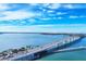 Breathtaking aerial view of a scenic causeway bridge on a clear day at 111 S Pineapple Ave # 804, Sarasota, FL 34236