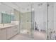 Stylish bathroom with glass walk-in shower, bright lighting, and modern vanity for a spa-like feel at 111 S Pineapple Ave # 804, Sarasota, FL 34236