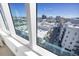 Stunning city view from a building with large windows, showing nearby businesses and downtown area at 111 S Pineapple Ave # 804, Sarasota, FL 34236