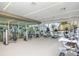 Bright fitness center featuring cardio equipment, weight machines, and mirrored wall at 111 S Pineapple Ave # 804, Sarasota, FL 34236