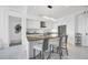 Bright, modern kitchen boasts stainless steel appliances and an island with bar seating at 111 S Pineapple Ave # 804, Sarasota, FL 34236