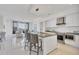 Open concept condo kitchen with modern appliances and ample counter space at 111 S Pineapple Ave # 804, Sarasota, FL 34236