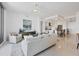 Open-concept floor plan of the living room, dining area and modern kitchen at 111 S Pineapple Ave # 804, Sarasota, FL 34236