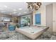 Modern lounge area with comfortable seating, billiard table and stylish decor at 111 S Pineapple Ave # 804, Sarasota, FL 34236