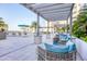 Comfortable outdoor lounge area with shade, seating, and manicured landscaping at 111 S Pineapple Ave # 804, Sarasota, FL 34236