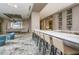 Elegant lounge area with a long bar and comfortable seating at 111 S Pineapple Ave # 804, Sarasota, FL 34236