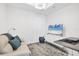 Cozy office with sofa, TV, and ergonomic desk setup, perfect for work or relaxation at 111 S Pineapple Ave # 804, Sarasota, FL 34236