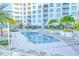 Inviting pool area with a jacuzzi and lots of seating for relaxation and entertainment at 111 S Pineapple Ave # 804, Sarasota, FL 34236