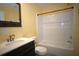 Stylish bathroom with modern vanity, sink, mirror, toilet, and shower/tub combination at 11337 Pineapple Rd, Punta Gorda, FL 33955