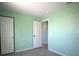 Bright bedroom with fresh paint and tile floors, and a large closet, perfect for storage at 11337 Pineapple Rd, Punta Gorda, FL 33955
