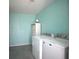 Practical laundry area with ample storage space and modern washer and dryer units at 11337 Pineapple Rd, Punta Gorda, FL 33955