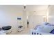 Bedroom with closet, daybed, desk, and ladder shelf for storage at 11371 Perico Isle Cir, Bradenton, FL 34209