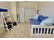 Bedroom with blue decor and ample closet space, ideal for a guest room or home office at 11371 Perico Isle Cir, Bradenton, FL 34209