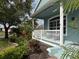 Charming front porch with landscaping and curb appeal at 11371 Perico Isle Cir, Bradenton, FL 34209