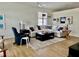 Bright living room featuring a comfortable sectional sofa and stylish decor at 11371 Perico Isle Cir, Bradenton, FL 34209