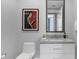 Modern half bathroom with sleek vanity, stylish mirror, and contemporary decor at 1155 N Gulfstream Ave # 1205, Sarasota, FL 34236