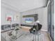 Modern living room with hardwood floors, gray walls, and sleek furniture for a minimalist and elegant space at 1155 N Gulfstream Ave # 1205, Sarasota, FL 34236