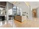 Modern lobby with sleek reception desk, tile floors, and floor to ceiling windows at 1155 N Gulfstream Ave # 1205, Sarasota, FL 34236