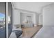 Bright main bedroom with large windows, a sitting area, and elegant neutral decor at 1155 N Gulfstream Ave # 1205, Sarasota, FL 34236