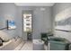 Cozy sitting area features a stylish bar, contemporary decor, and a relaxing ambiance at 1155 N Gulfstream Ave # 1205, Sarasota, FL 34236