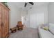 Bedroom boasts a neutral color palette, closet space, and an open entryway at 12140 Whisper Lake Dr, Bradenton, FL 34211