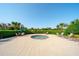 Relaxing hot tub area with comfortable seating surrounded by beautiful landscaping at 12140 Whisper Lake Dr, Bradenton, FL 34211