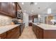 Spacious kitchen with stainless appliances, center island, and ample counter space at 12140 Whisper Lake Dr, Bradenton, FL 34211