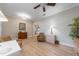 Cozy office space with hardwood floors, a leather chair, and ample natural light at 12140 Whisper Lake Dr, Bradenton, FL 34211