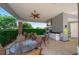 Convenient outdoor kitchen area with grill, sink, and ample seating for community gatherings at 12140 Whisper Lake Dr, Bradenton, FL 34211