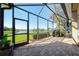 Spacious screened patio offering beautiful lake views at 12140 Whisper Lake Dr, Bradenton, FL 34211