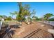Community playground featuring slides and play structures within a safe, fenced area at 12140 Whisper Lake Dr, Bradenton, FL 34211