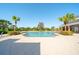 Inviting community pool with ample seating, perfect for relaxation and recreation at 12140 Whisper Lake Dr, Bradenton, FL 34211