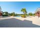 Beautiful community pool area surrounded by lush landscaping and comfortable seating at 12140 Whisper Lake Dr, Bradenton, FL 34211