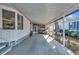Spacious carport featuring ample parking space and a covered entrance to the home at 135 Oakwood Ln, Sarasota, FL 34237