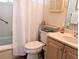 Clean bathroom with a tub-shower, toilet, and vanity with countertop space at 1531 Pleasant Rd # H-3, Bradenton, FL 34207