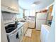 Functional kitchen with white cabinets, modern appliances, and a clean, bright atmosphere at 1531 Pleasant Rd # H-3, Bradenton, FL 34207