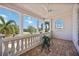 Charming balcony with brick floors and a view, perfect for relaxing in the outdoors at 17809 Howling Wolf Run, Parrish, FL 34219
