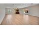 Open bonus room with a wet bar and access to the lanai with pool views at 17809 Howling Wolf Run, Parrish, FL 34219