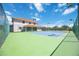 View of the private tennis court, offering residents a fantastic recreational amenity at 17809 Howling Wolf Run, Parrish, FL 34219