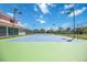 View of the private tennis court, offering residents a fantastic recreational amenity at 17809 Howling Wolf Run, Parrish, FL 34219