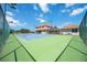 View of the private tennis court, offering residents a fantastic recreational amenity at 17809 Howling Wolf Run, Parrish, FL 34219