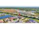 A scenic aerial view of a home showcasing its prime location near waterways and lush green spaces at 18115 Littleton Pl, Bradenton, FL 34202