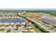 Aerial view of the house in neighborhood near lush surroundings with long drive and 2 car garage at 18115 Littleton Pl, Bradenton, FL 34202