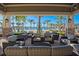 Comfortable outdoor seating area by the pool, perfect for relaxation and socializing with friends and Gathering at 18115 Littleton Pl, Bradenton, FL 34202