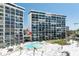 Resort condo boasts a refreshing pool, beach access, and serene coastal living at 20 Whispering Sands Dr # 301, Sarasota, FL 34242