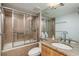 Bathroom features tile shower and granite countertop at 20 Whispering Sands Dr # 301, Sarasota, FL 34242